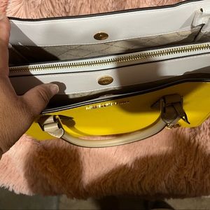 Is a beautiful tote you can make crossbody is a pretty yellow and white